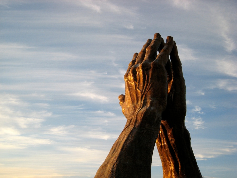 Photo of a statue of praying hands at Oral Roberts University, Tulsa.